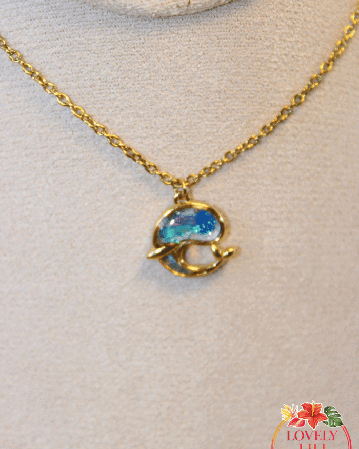 collier chant de la baleine doré gros zoom